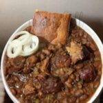 Pinto Beans,Ham Hocks Cornbread And Pickled Onions