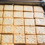 Mom lines up Saltine crackers on tray, makes her famous Christmas ‘crack’ in no time